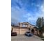 Charming two-story home with a three car garage and covered front porch with large tree at 2544 S Fundy Cir, Aurora, CO 80013