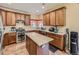 Modern kitchen with quartz countertops, stainless steel appliances, and ample cabinet space, perfect for cooking at 2544 S Fundy Cir, Aurora, CO 80013