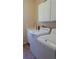 Well-lit laundry room equipped with modern washer and dryer at 2544 S Fundy Cir, Aurora, CO 80013