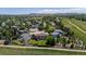 Beautiful aerial shot of homes in a neighborhood surrounded by lush greenery and open spaces at 4099 Starflower Rd, Castle Rock, CO 80109