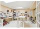 Spacious hobby room features a large desk area, natural light, and plenty of storage for crafts and projects at 4099 Starflower Rd, Castle Rock, CO 80109