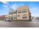 Exterior view of the industrial-style loft building with large windows at 1515 N Ogden St # 7, Denver, CO 80218