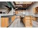 Bright updated kitchen features stainless steel appliances, granite countertops, and hardwood floors at 1515 N Ogden St # 7, Denver, CO 80218