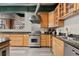 Gourmet kitchen features stainless steel appliances, granite countertops, and hardwood floors at 1515 N Ogden St # 7, Denver, CO 80218