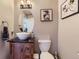 Stylish powder room with modern fixtures and decorative accents at 1897 S Buchanan Cir, Aurora, CO 80018