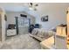 Bedroom with vaulted ceilings and a window with blinds and curtains at 1897 S Buchanan Cir, Aurora, CO 80018