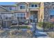 Charming townhome with a fenced front patio perfect for relaxing outdoors at 1897 S Buchanan Cir, Aurora, CO 80018