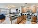 Modern kitchen with stainless steel appliances, granite countertops, and ample cabinet space at 1897 S Buchanan Cir, Aurora, CO 80018