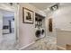 Convenient upstairs laundry area with washer, dryer, and ample storage at 1897 S Buchanan Cir, Aurora, CO 80018