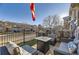 Cozy patio with outdoor seating, perfect for relaxing and enjoying the neighborhood view at 1897 S Buchanan Cir, Aurora, CO 80018