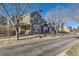 Street view of stylish townhomes showcasing attractive architecture and curb appeal at 1897 S Buchanan Cir, Aurora, CO 80018