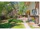 The backyard features a walkway, patio, brick oven and plenty of room for outdoor activities at 8484 E Radcliff Ave, Denver, CO 80237