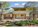 The two story home features a patio on the first and second floor for outdoor living at 8484 E Radcliff Ave, Denver, CO 80237