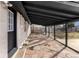 Covered back patio featuring an outdoor seating area at 8051 Clarkson Ct, Denver, CO 80229