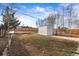 Backyard featuring a storage shed and lots of yard space at 8051 Clarkson Ct, Denver, CO 80229