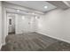 Finished basement with access to bathroom and laundry area at 8051 Clarkson Ct, Denver, CO 80229