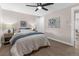 Bright bedroom with natural light, neutral colors, and a ceiling fan at 8051 Clarkson Ct, Denver, CO 80229