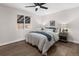 Cozy bedroom with a ceiling fan, natural light, and neutral décor. Fresh paint at 8051 Clarkson Ct, Denver, CO 80229