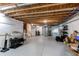 Spacious unfinished basement, ready for customization with visible ceiling beams and ample natural light at 10152 Southlawn Cir, Commerce City, CO 80022