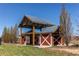 Community shelter with picnic tables perfect for a gathering at 10152 Southlawn Cir, Commerce City, CO 80022