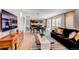 Open-concept living and dining area, seamlessly connected to the kitchen, offering a great living space at 10152 Southlawn Cir, Commerce City, CO 80022