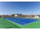 Tennis court within a community, perfect for recreational play at 10152 Southlawn Cir, Commerce City, CO 80022