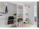 Well-organized walk-in closet featuring ample shelving, carpet flooring, and open storage spaces at 26176 Sweetbriar Trl, Evergreen, CO 80439