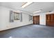 Finished basement area with windows and built-in closet at 835 S Geneva St, Aurora, CO 80247