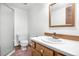 Clean bathroom with a shower, toilet, and vanity sink at 835 S Geneva St, Aurora, CO 80247