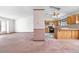 Open floor plan featuring a spacious living room, a functional kitchen and a unique design at 835 S Geneva St, Aurora, CO 80247