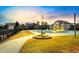 Beautiful backyard and community space featuring a walkway and manicured lawn at 11886 E Fair Ave, Greenwood Village, CO 80111