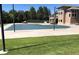 Community covered pool and patio, surrounded by manicured green grass at 11886 E Fair Ave, Greenwood Village, CO 80111