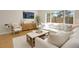 Cozy living room filled with natural light, showcasing stylish furnishings and a serene atmosphere at 11886 E Fair Ave, Greenwood Village, CO 80111