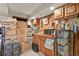 Unfinished basement featuring a storage area with abundant shelving at 4231 S Fairplay Cir # A, Aurora, CO 80014