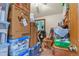 Cluttered bedroom with boxes and containers, showcasing the need for organization and storage solutions at 4231 S Fairplay Cir # A, Aurora, CO 80014