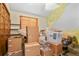 Cluttered bedroom with boxes and containers, showcasing the need for organization and storage solutions at 4231 S Fairplay Cir # A, Aurora, CO 80014
