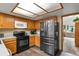 Updated kitchen with stainless steel appliances and ample cabinet space, perfect for cooking enthusiasts at 4231 S Fairplay Cir # A, Aurora, CO 80014