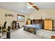 Spacious bedroom with vaulted ceilings, a cozy feel, and natural light at 4231 S Fairplay Cir # A, Aurora, CO 80014