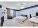 Bedroom featuring a comfortable chair and desk, along with a window providing natural light at 1662 S Blackhawk Way # A, Aurora, CO 80012
