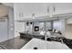 Open kitchen view into a cozy living space with modern amenities at 1662 S Blackhawk Way # A, Aurora, CO 80012