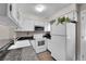 Functional kitchen with modern appliances and ample counter space at 1662 S Blackhawk Way # A, Aurora, CO 80012
