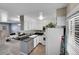 Bright kitchen flowing into the living area, perfect for entertaining at 1662 S Blackhawk Way # A, Aurora, CO 80012