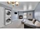 Living room with fireplace, laundry, and open layout at 1662 S Blackhawk Way # A, Aurora, CO 80012