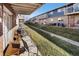 Outdoor patio area with seating, with access to green space and other units at 1143 Lamar St # 6, Lakewood, CO 80214