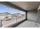 Balcony with a view of a residential neighborhood with single Gathering homes at 8480 Eagle River St, Littleton, CO 80125