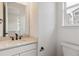 Powder room featuring a modern vanity and faucet at 8480 Eagle River St, Littleton, CO 80125