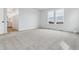 Bright and spacious bedroom features large windows and a neutral color palette at 8480 Eagle River St, Littleton, CO 80125