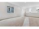 Bright bedroom with large windows, neutral walls, and carpeted flooring at 8480 Eagle River St, Littleton, CO 80125