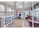 Office space showcases built-in shelving, desk, and comfortable seating area at 3545 Cottonwood Cir, Longmont, CO 80504
