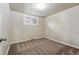 This simple bedroom has neutral walls and carpet at 8736 W 46Th Ave, Wheat Ridge, CO 80033